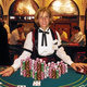 A Bally's blackjack dealer shows off a tiny portion of the casino's winnings.